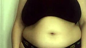 Chubby bbw tries on tight bikini bras squeezing big tits