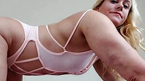 teasing milf slips into bikinis highlighting her huge sexy ass