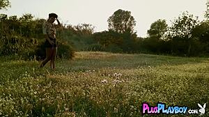 hot anetta keys strips naked posing tits outdoors in grass