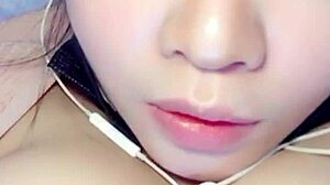 What secrets hide behind this sexy Chinese webcam girl's intriguing show?