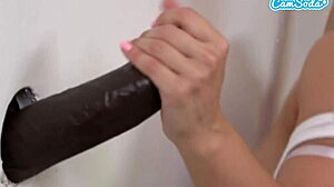 Horny white girl blows two BBCs at glory hole