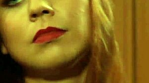 Kissing hot lesbian slaves, madame fingers their wet pussies while dominating both!