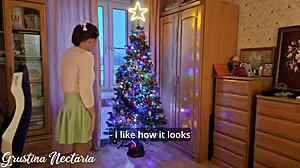 Skinny Tanned Brunette Gives Holiday Christmas Tree Blowjob