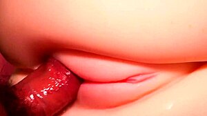 Shaved Pink Pussy Stuffed with Double Toys Close-Up