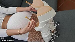 Milf parades perfect ass in high-heeled boots and fishnets