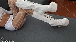 Milf parades perfect ass in high-heeled boots and fishnets