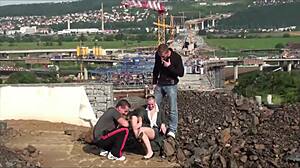 cute blonde teen gets public threesome fuck at construction site with two guys