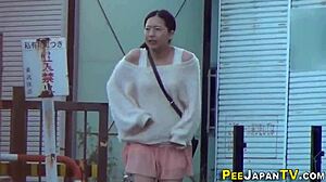 Asian women urinate publicly in outdoor fetish scenes