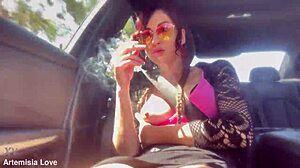 Italian milf flashes tits in car