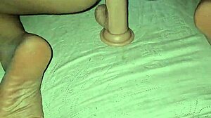 Double penetration with dildo and cock inside