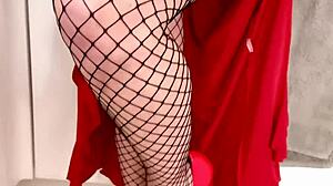 Lady lucy in slinky dress heels and fishnet pantyhose
