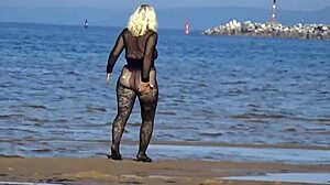 black style flashing big ass on the beach