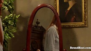 Submissive lesbian slaves tied up and whipped together