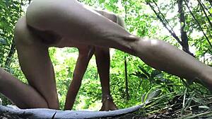 Young woman enjoys solo moment outdoors in forest