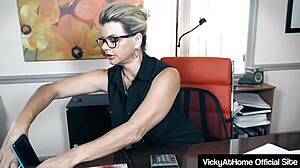 Busty blonde milf rubs her wet pussy at work desk