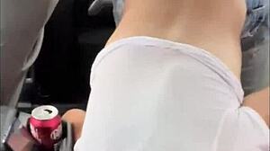 streetwalker in a wet t-shirt gives a blowjob in the backseat of a car and keeps sucking after the guy cums in her mouth