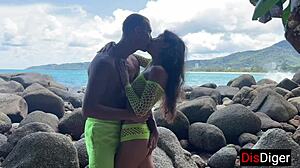 young couple fucking hot on a public beach overlooking the sea
