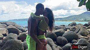 young couple fucking hot on a public beach overlooking the sea