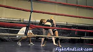 Muscular Women Wrestle In A Boxing Ring
