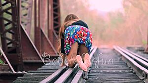 Girl with brown eyes and big natural tits walking