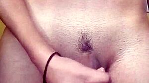 I masturbate my shaved cock in the shower