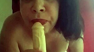 Licking my big tits while playing