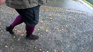 Wearing stockings outdoors in public view.