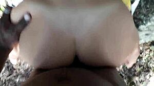 Black guy fucks submissive slut in forest