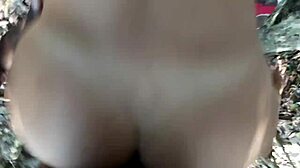 Black guy fucks submissive slut in forest