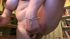 Shemale with big tits and huge cock shows off curvy ass in close-up homemade action.